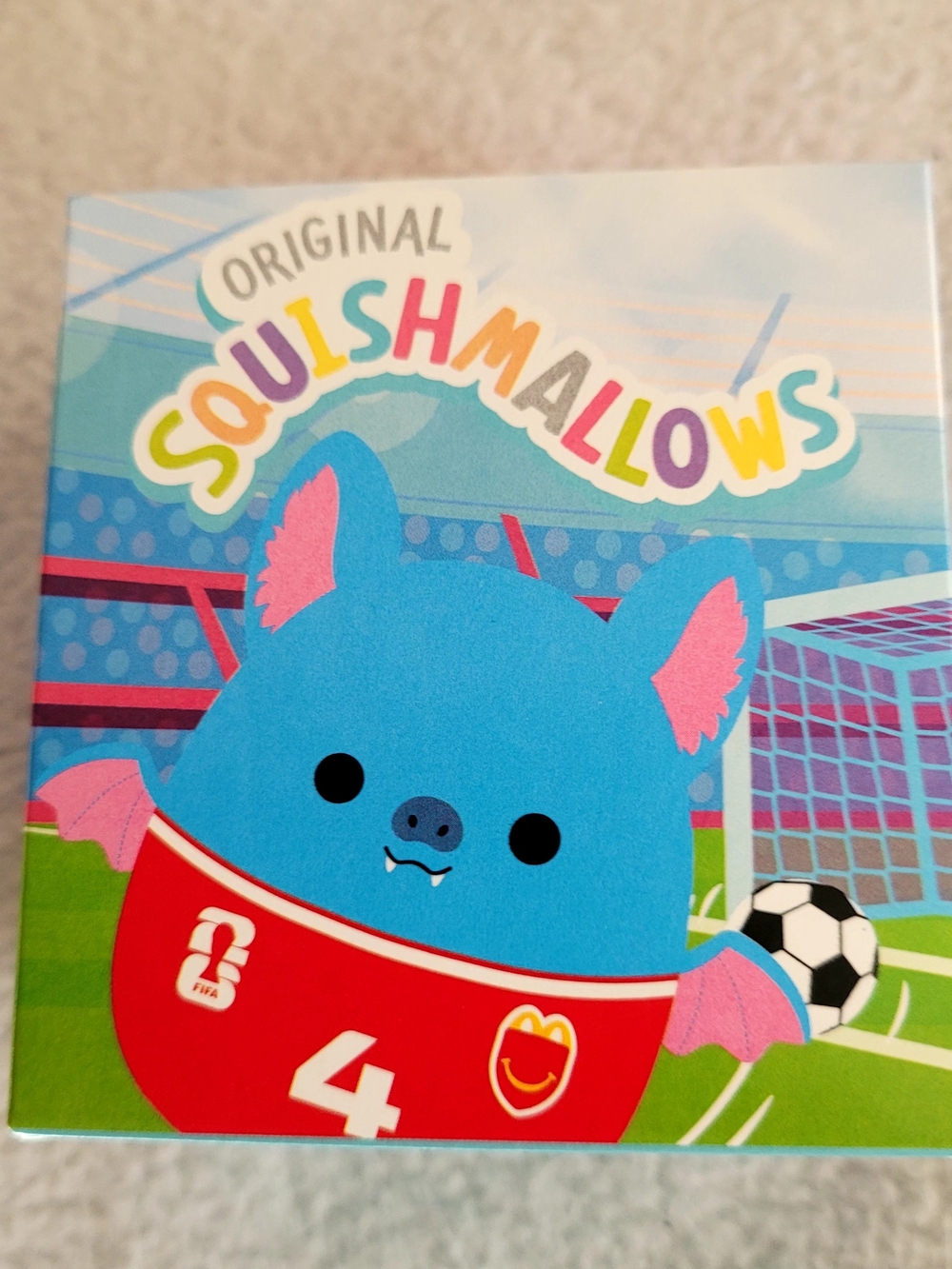 Squishmallows Blue Bat in Red Soccer Jersey
